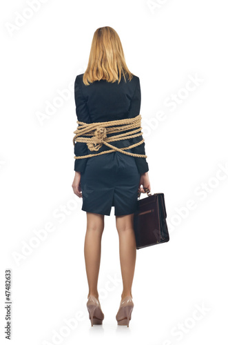 Photo: Tied woman in business concept Tied woman in business concept