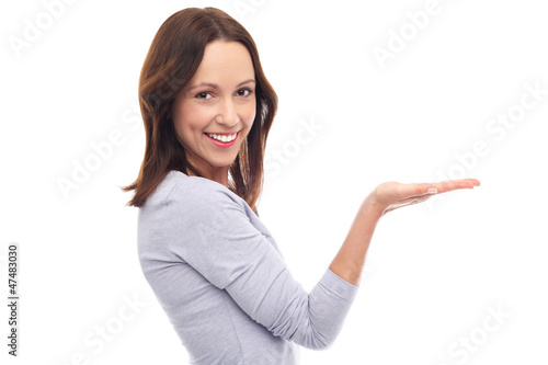 Photo: Woman presenting something Woman presenting something