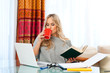 woman working on laptop at home