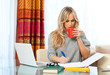 woman working on laptop at home