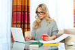 woman working on laptop at home