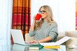 woman working on laptop at home