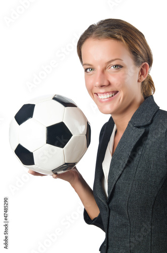 Photo: Businesswoman with football on white Businesswoman with football on white