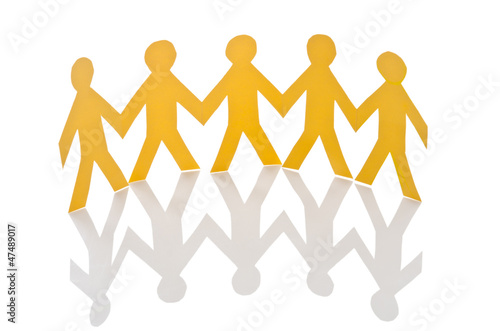Photo: Teamwork concept with paper cut people Teamwork concept with paper cut people