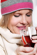 Mid age Woman With Hot tea Wearing Winter Clothes