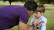 Parenthood and children education, angry man scolding boy