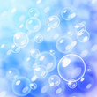 Blurred bubbles over blue