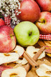 Fresh apples and dried apple slices