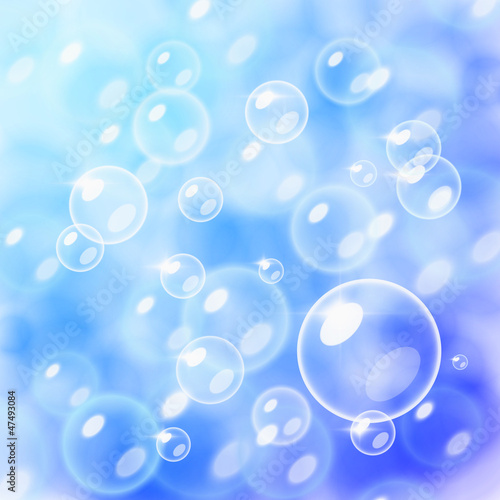 Vector: Blurred bubbles over blue Blurred bubbles over blue