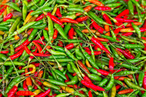 Photo: Texture of red and green chili peppers Texture of red and green chili peppers