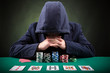 Photo: Poker player on black background Poker player on black background
