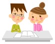 資料を見て悩む夫婦 資料を見て悩む夫婦