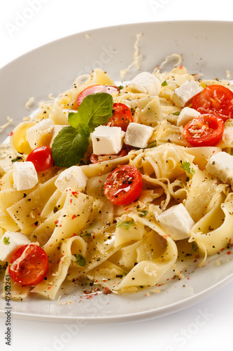 Photo: Pasta with tomato and white cheese Pasta with tomato and white cheese
