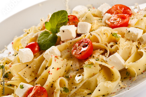Photo: Pasta with tomato and white cheese Pasta with tomato and white cheese