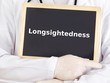 Doctor shows information: longsightedness