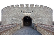 Isolated on white entrance to a medieval circular citadel tower
