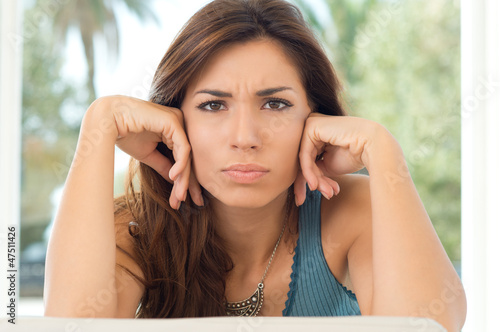 Photo: Serious Young Woman Serious Young Woman
