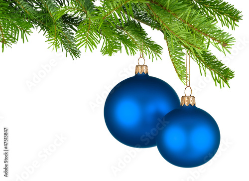 Photo: Zwei blaue Christbaumkugeln hängen am Tannenzweig Zwei blaue Christbaumkugeln hängen am Tannenzweig