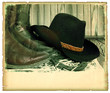 Vintage western background with cowboy hat on old paper for text