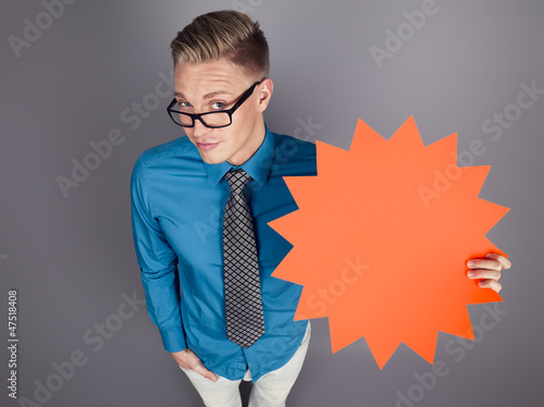 Photo: Salesman holding empty sign with space for advertising. Salesman holding empty sign with space for advertising.
