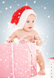 Photo: santa helper baby with christmas gifts santa helper baby with christmas gifts