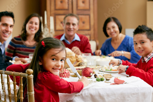 Photo: Multi Generation Family Celebrating With Christmas Meal Multi Generation Family Celebrating With Christmas Meal