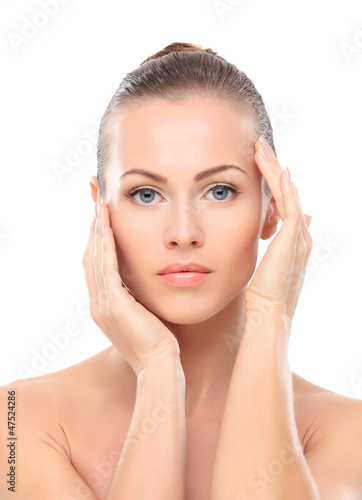 Photo: Beauty face of beautiful woman with clean fresh skin - isolated Beauty face of beautiful woman with clean fresh skin - isolated