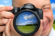 Photographer capturing rural landscape
