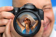 Photo: Photographer capturing portrait of bikini girl Photographer capturing portrait of bikini girl