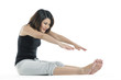 Beautiful Chinese woman stretching before exercise