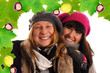 Two young woman in winter clothes