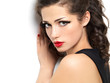 Beautiul fashion girl with red manicure and lips