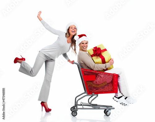 Photo: Santa Christmas couple with a gift. Santa Christmas couple with a gift.