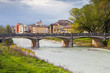 view of bridge through Parma stream, Italy