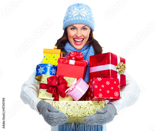 Photo: Beautiful christmas girl with gifts. Beautiful christmas girl with gifts.