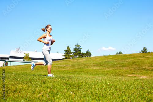 Photo: Jogging woman. Jogging woman.