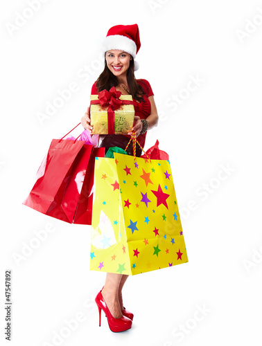 Photo: Christmas Shopping santa woman. Christmas Shopping santa woman.