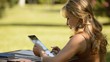 Video: Young woman with digital tablet computer studying at college Young woman with digital tablet computer studying at college