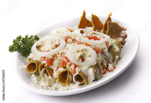 Photo: Tacos dorados de pollo. Comida mexicana Tacos dorados de pollo. Comida mexicana