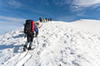 Hike in winter mountain.