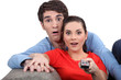 Couple watching television
