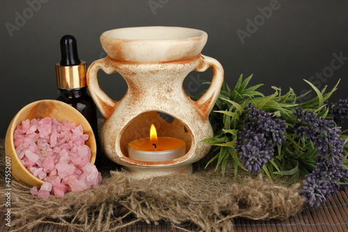 Photo: Aromatherapy lamp on grey background Aromatherapy lamp on grey background