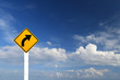 Direction sign- right turn warning on blue sky background