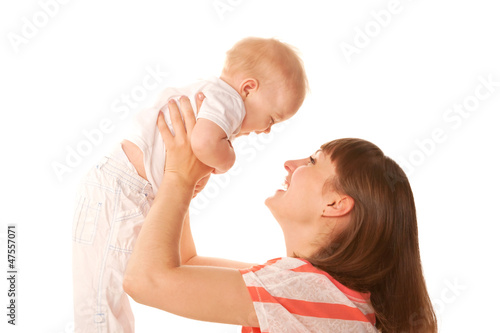 Photo: Mother and baby laughing and playing. Mother and baby laughing and playing.