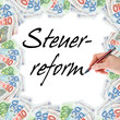 Hand mit Stift schreibt Steuerreform