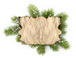 Photo: Old parchment paper with copy space on Christmas tree branch bac Old parchment paper with copy space on Christmas tree branch bac