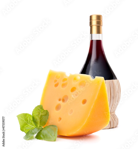 Photo: Red wine bottle and cheese still life Red wine bottle and cheese still life