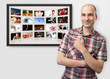 man pointing finger on digital photo album