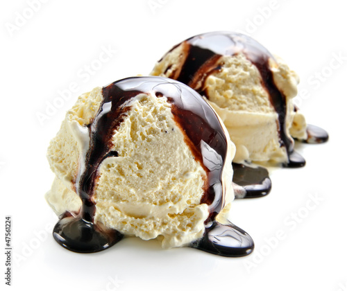 Photo: Two ice cream scoops with chocolate sauce Two ice cream scoops with chocolate sauce