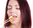 woman eating sushi